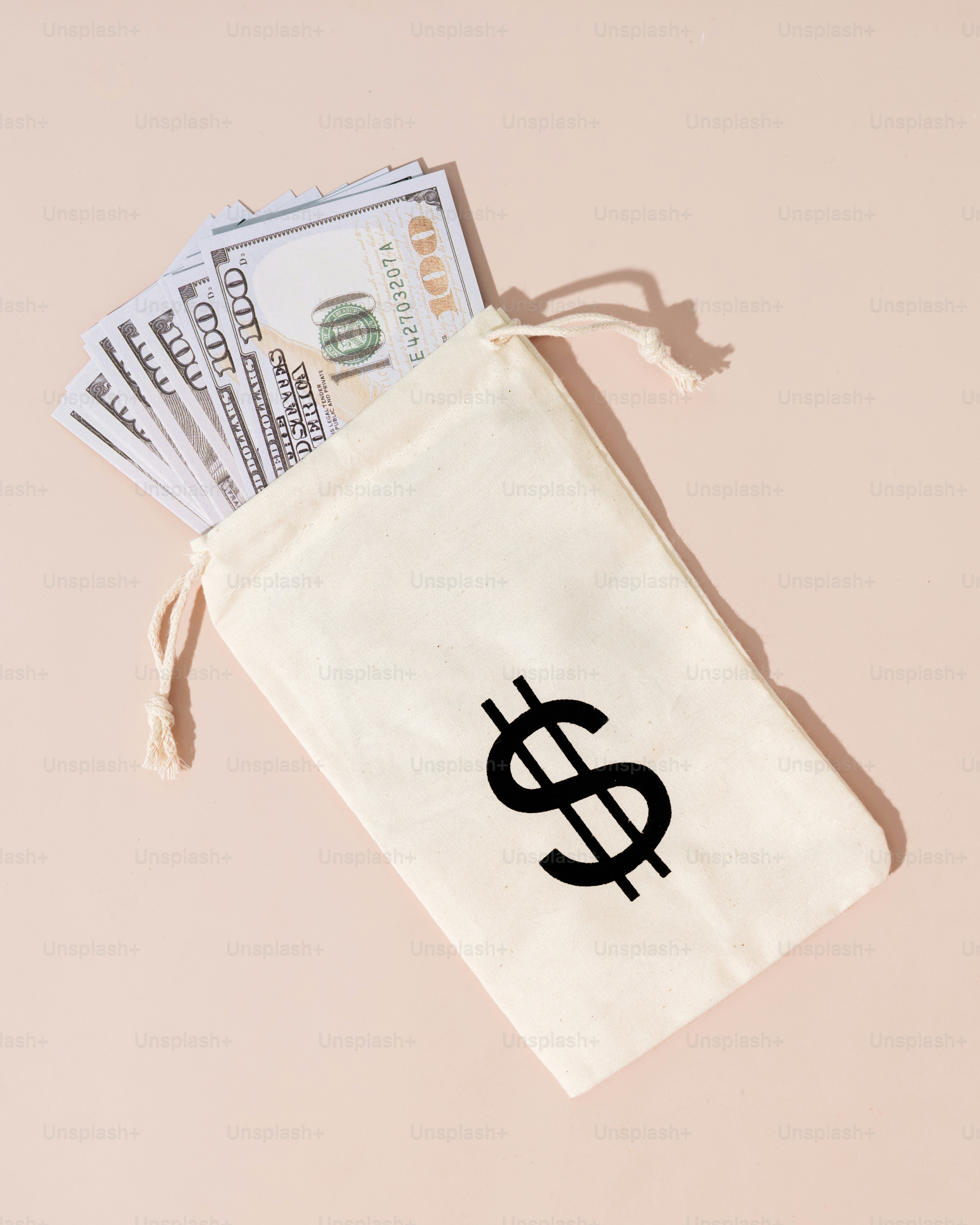 a bag of money sitting on top of a table